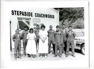 Archive photo of the Stepaside Coachworks team outside the workshop